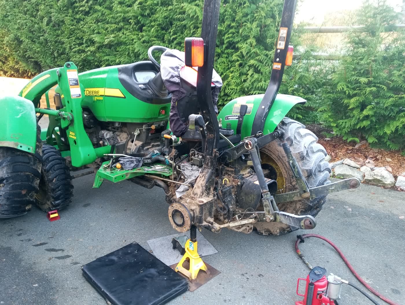 Compact utility tractor, typical of the BX, B, L, LX, and JD compact tractors JSD services on Fraser Valley acreages and small farms.